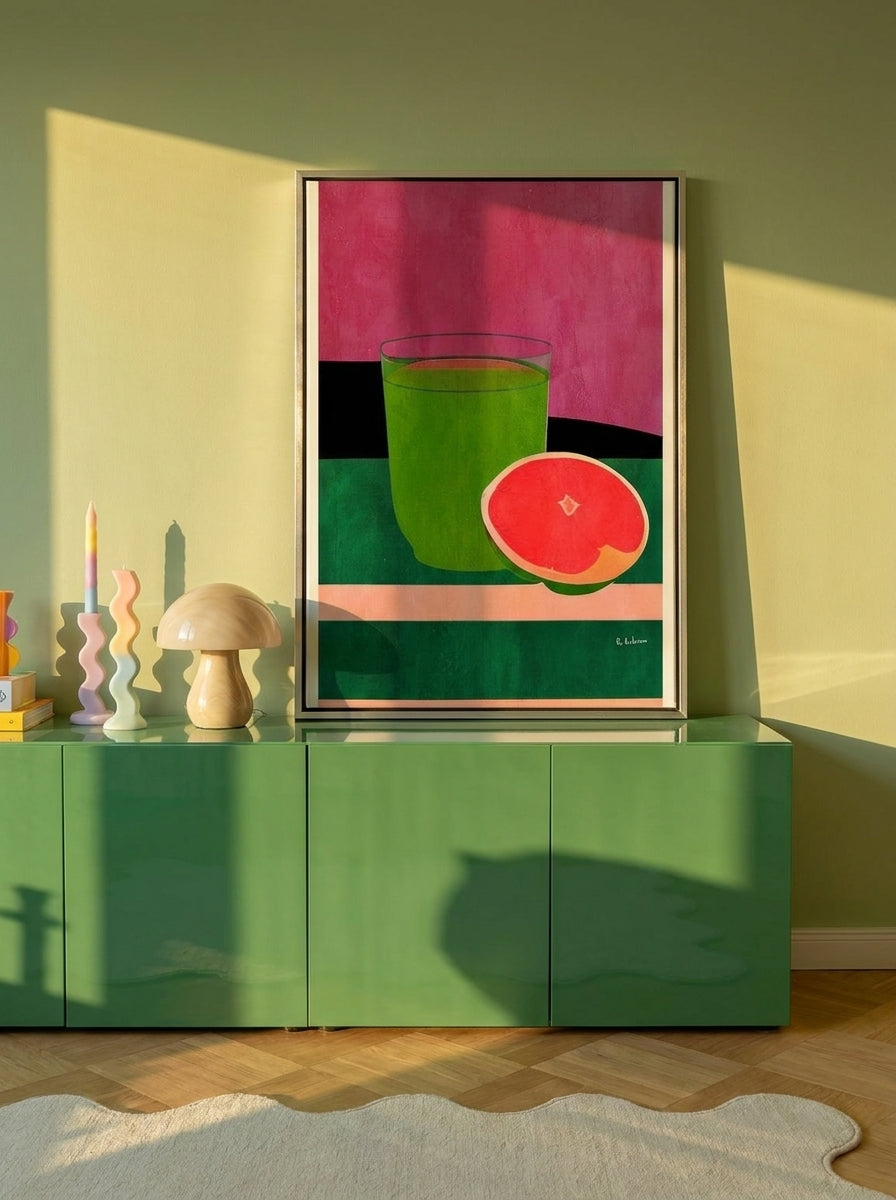 Canvas wall art with a silver leaf surround standing on a sideboard in a colourful eclectic living room