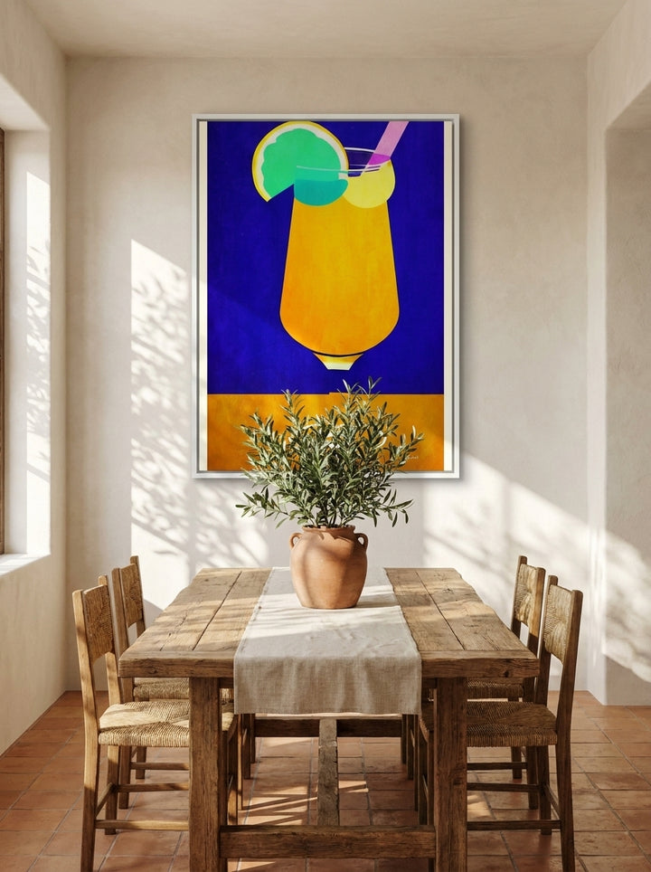 Oversized statement canvas wall art with a white surround styled on the wall in a Mediterranean dining room