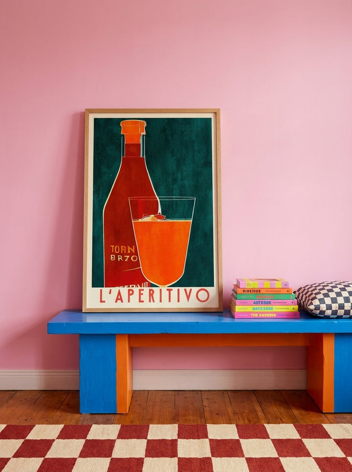 Modern wall art print standing on a side table in a colourful eclectic bedroom