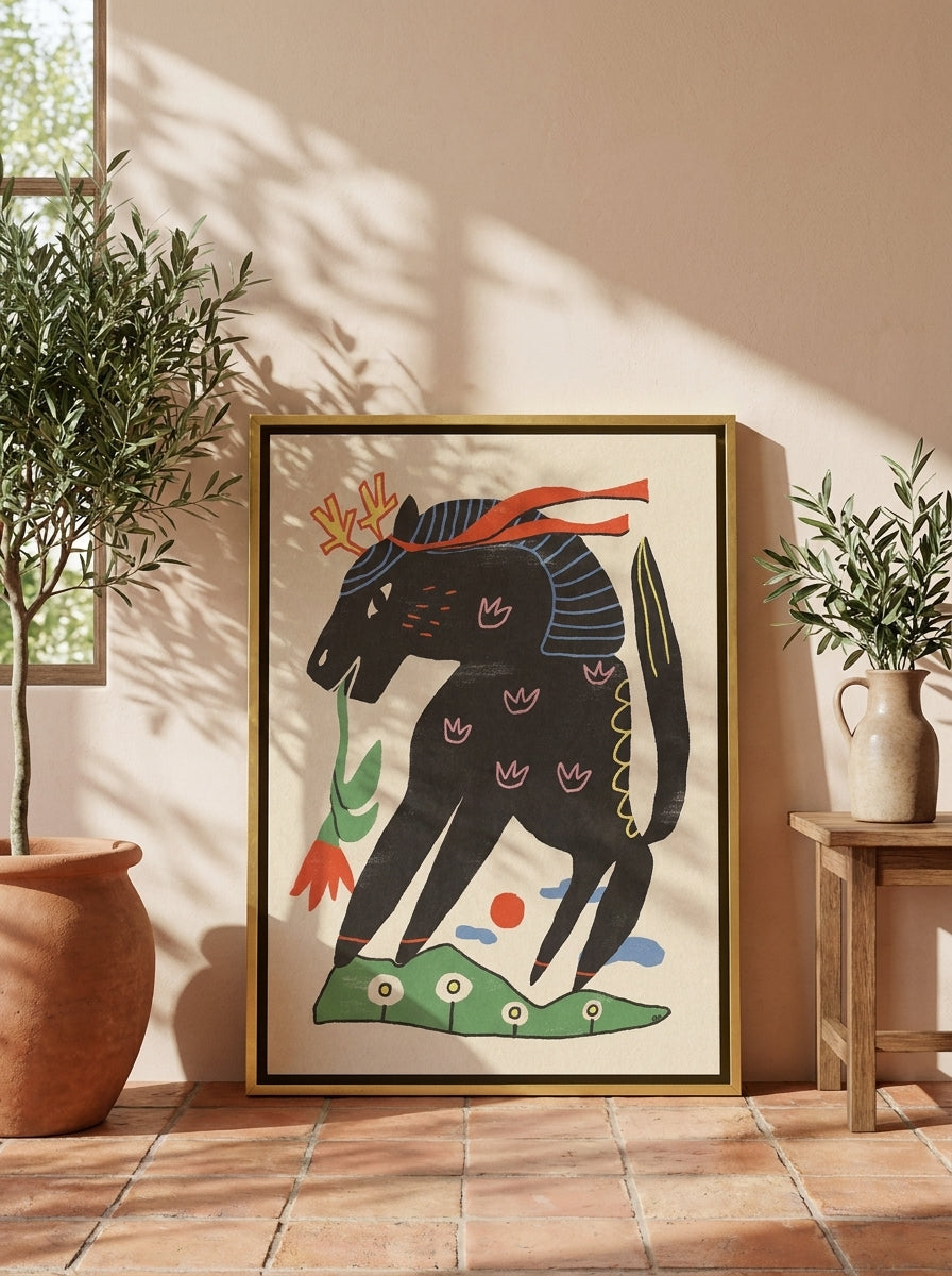 Canvas wall art with a gold leaf surround leaning against the wall in a Mediterranean home office