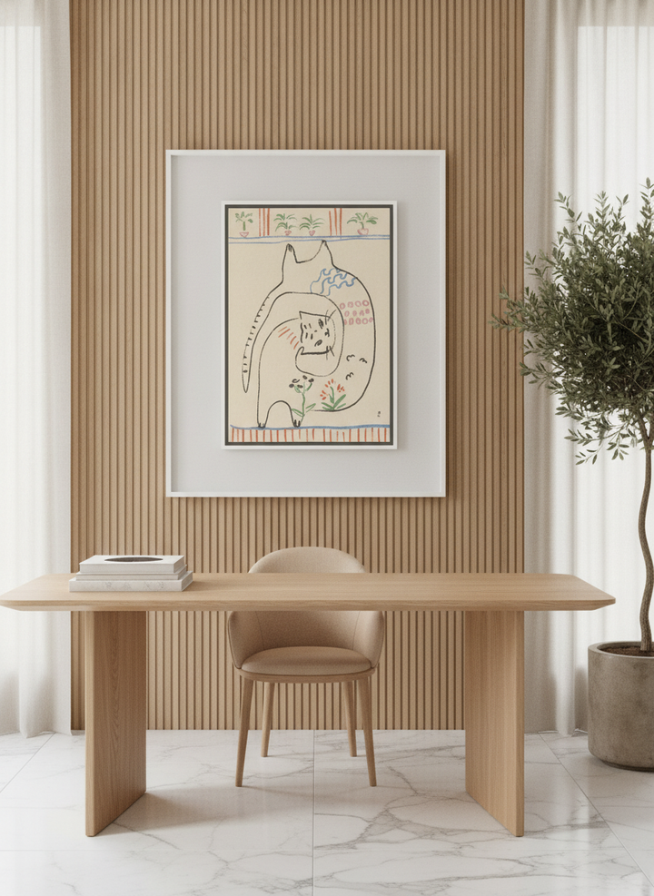 Canvas wall art with a white surround styled on the wall in a luxe home office