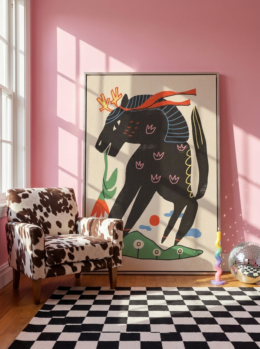 Oversized statement canvas wall art with a silver leaf surround leaning against the wall in a colourful eclectic bedroom