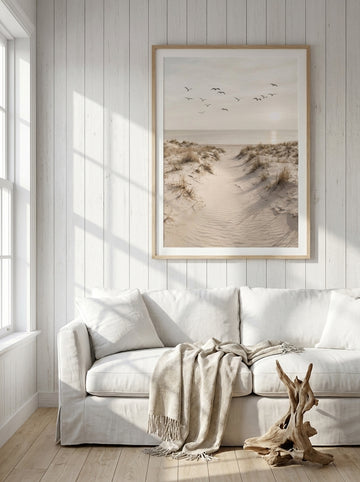 Modern wall art print styled on the wall in a coastal living room