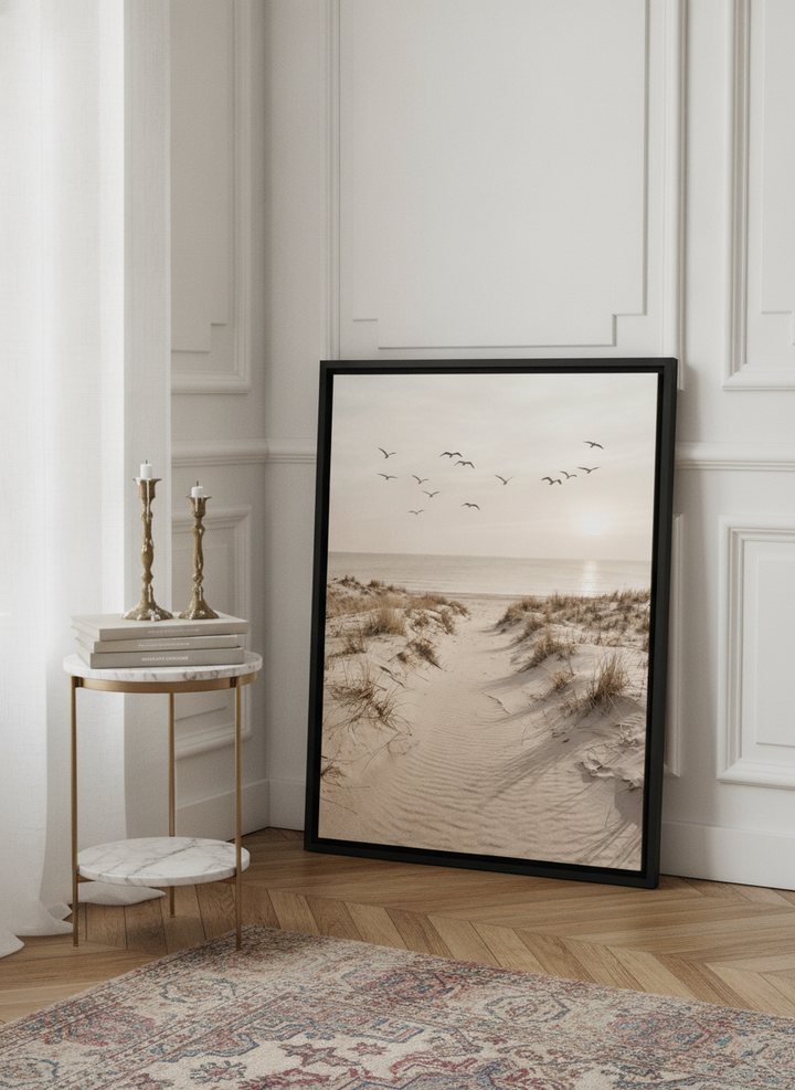 Canvas wall art with a black surround leaning against the wall in a Parisian bathroom