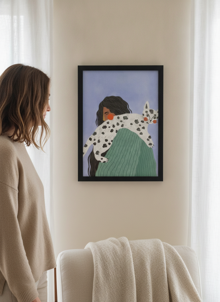 Person holding modern wall art print in a coastal living room
