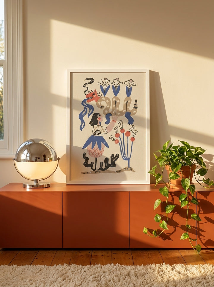 Modern wall art print standing on a sideboard in a retro 70s bedroom