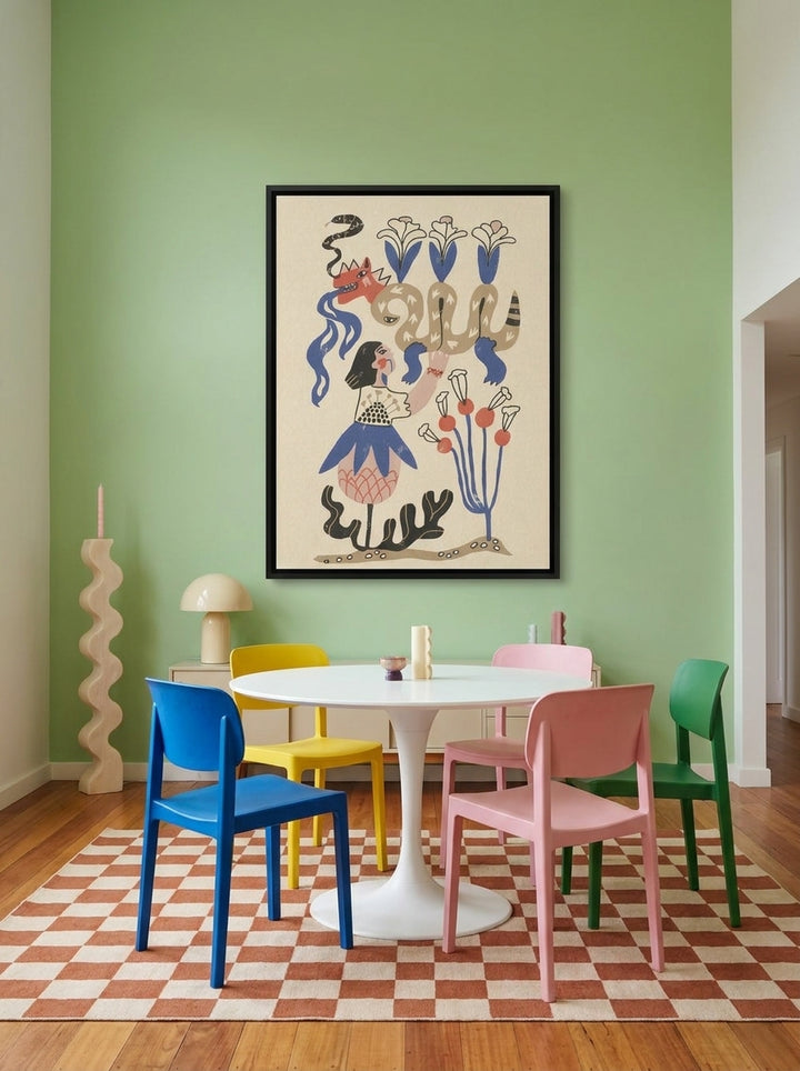 Oversized statement canvas wall art with a black surround styled on the wall in a colourful eclectic dining room