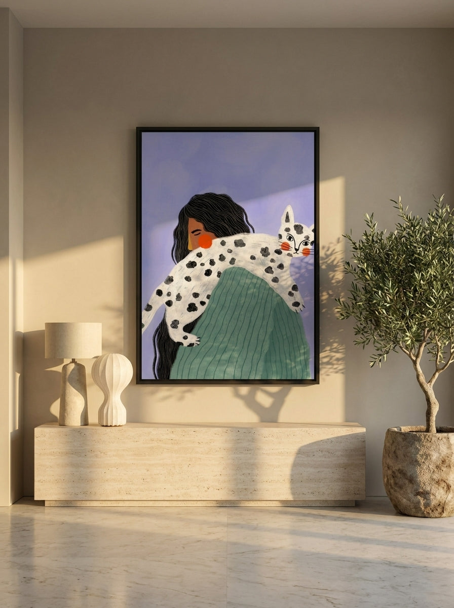 Oversized statement canvas wall art with a black surround styled on the wall in a luxe living room