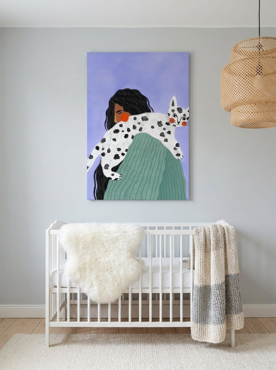Stretched canvas wall art styled on the wall in a bright Scandinavian nursery