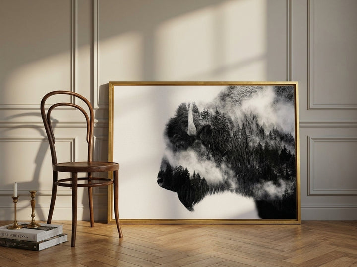 Canvas wall art with a gold leaf surround leaning against the wall in a Parisian home office