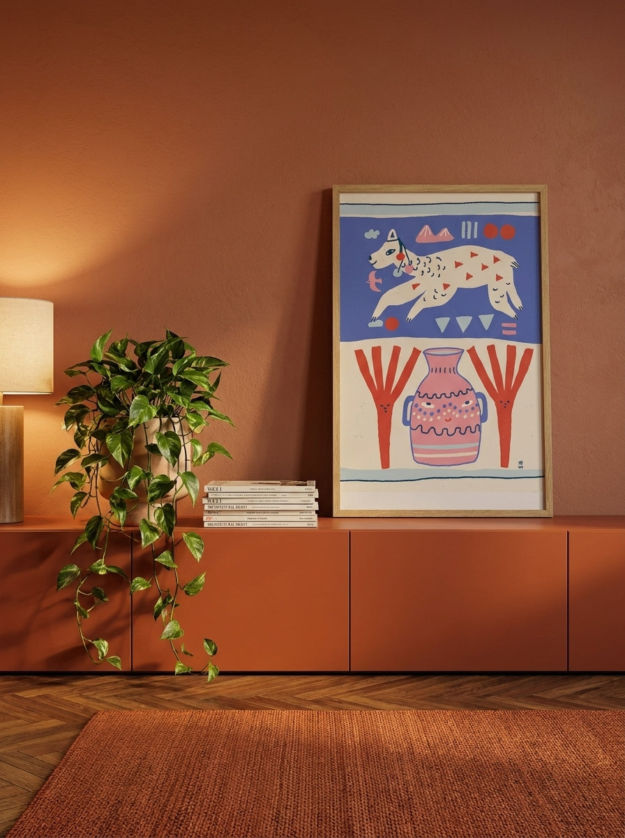 Modern wall art print standing on a sideboard in a retro 70s bedroom