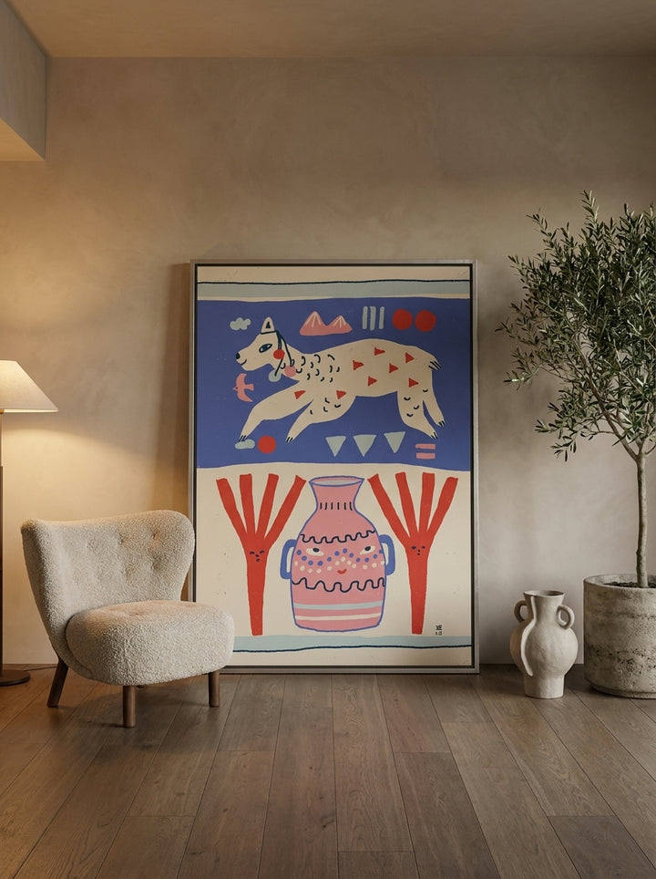 Oversized statement canvas wall art with a silver leaf surround leaning against the wall in a luxe dining room