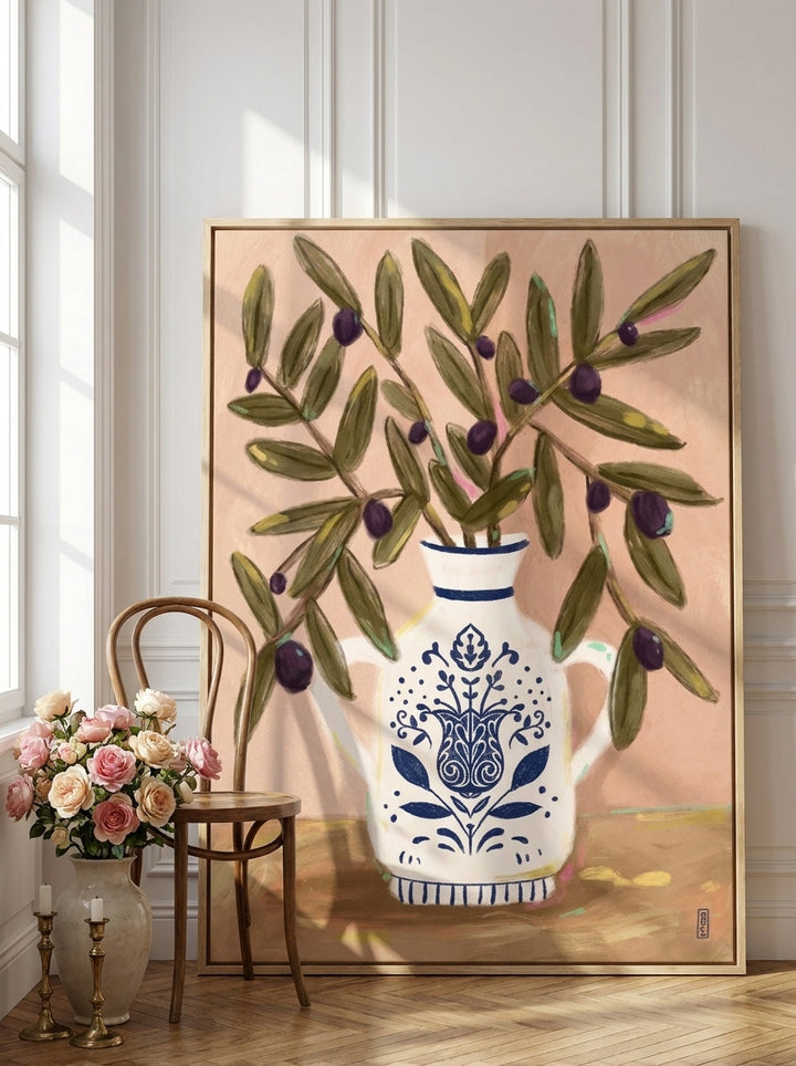 Oversized statement canvas wall art with a natural timber surround leaning against the wall in a Parisian bathroom