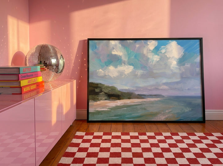 Modern wall art print standing on a sideboard in a colourful eclectic home office