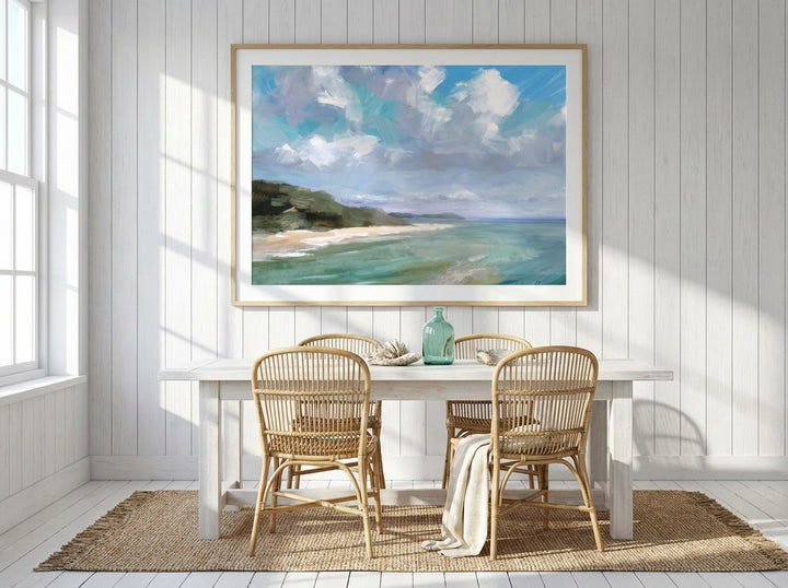 Modern wall art print styled on the wall in a coastal dining room