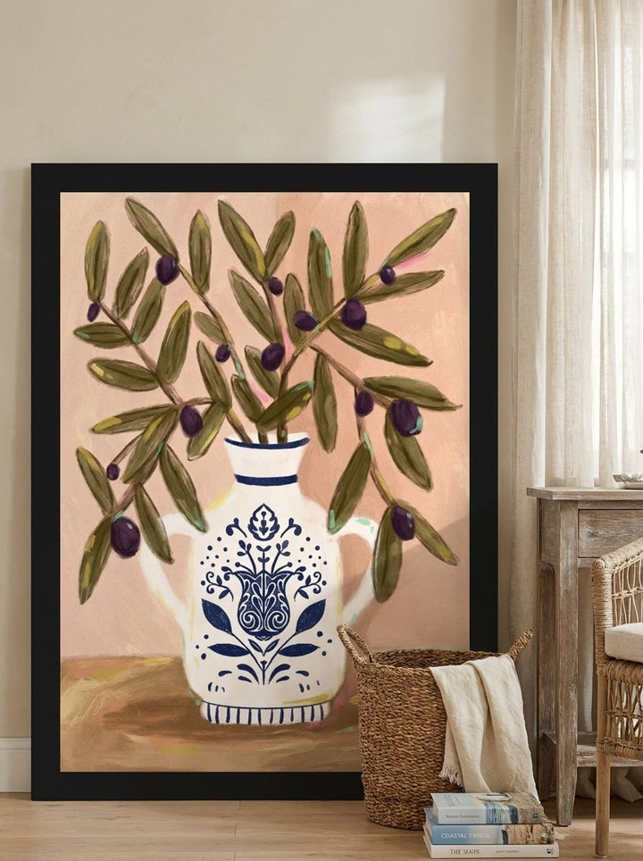 Oversized statement modern wall art print leaning against the wall in a coastal dining room