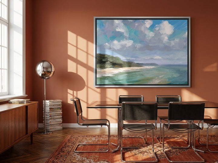 Oversized statement canvas wall art with a silver leaf surround styled on the wall in a retro 70s dining room