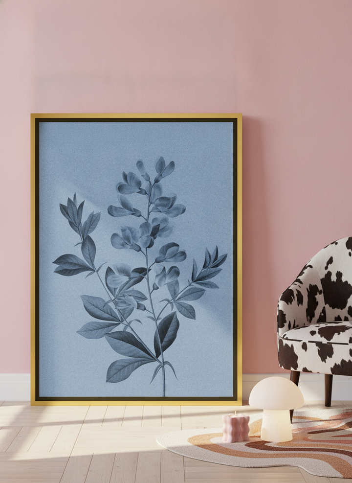Canvas wall art with a gold leaf surround leaning against the wall in a colourful eclectic bedroom