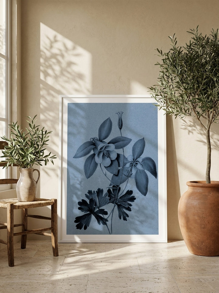 Modern wall art print leaning against the wall in a Mediterranean bedroom