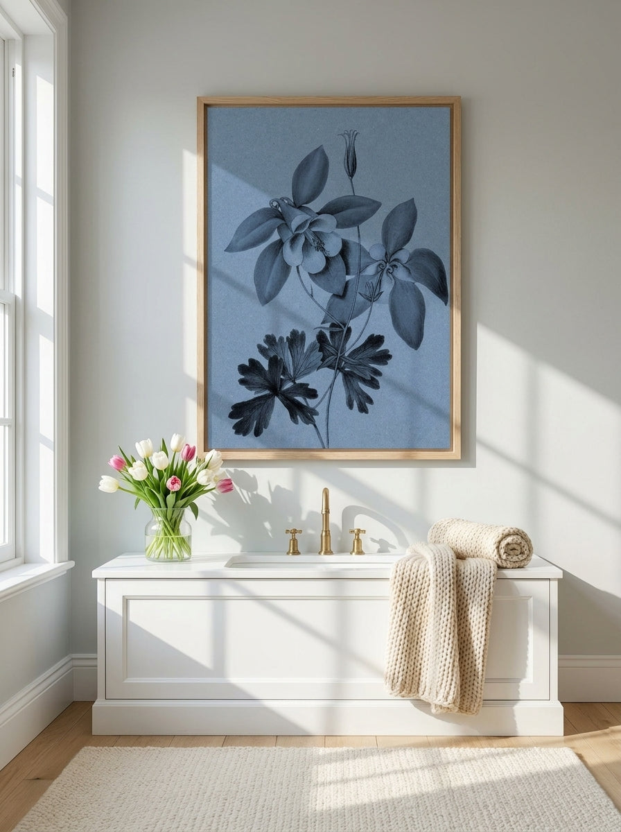Modern wall art print styled on the wall in a bright Scandinavian bathroom