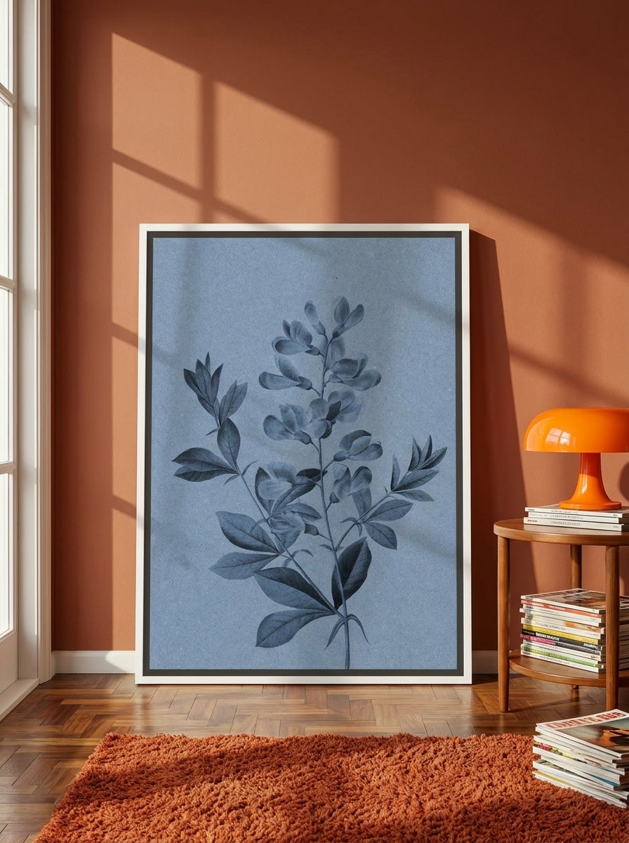 Canvas wall art with a white surround leaning against the wall in a retro 70s home office