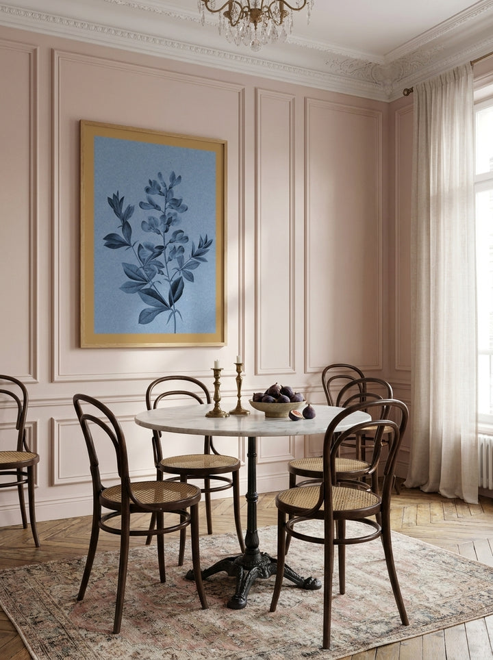 Oversized statement modern wall art print styled on the wall in a Parisian dining room