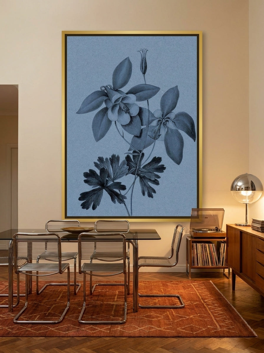 Oversized statement canvas wall art with a gold leaf surround styled on the wall in a retro 70s dining room