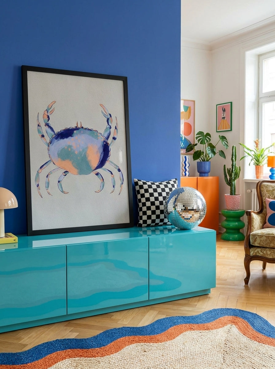 Modern wall art print standing on a sideboard in a colourful eclectic living room