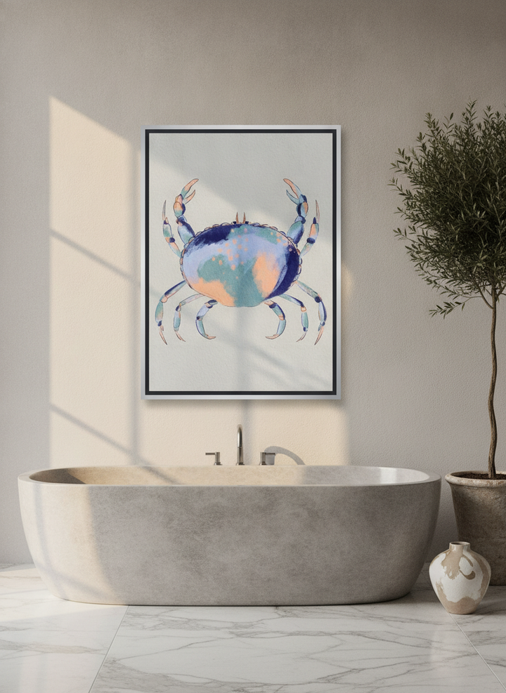 Canvas wall art with a silver leaf surround styled on the wall in a luxe bathroom