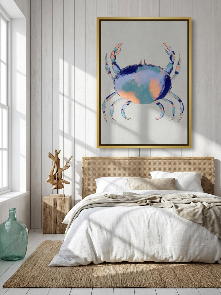 Oversized statement canvas wall art with a gold leaf surround styled on the wall in a coastal bedroom