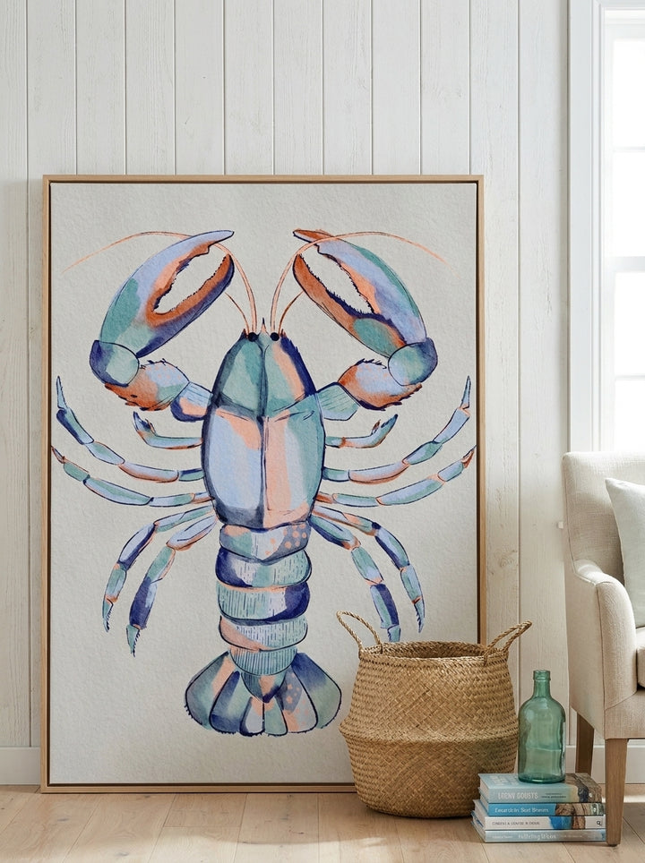 Oversized statement canvas wall art with a natural timber surround leaning against the wall in a coastal living room
