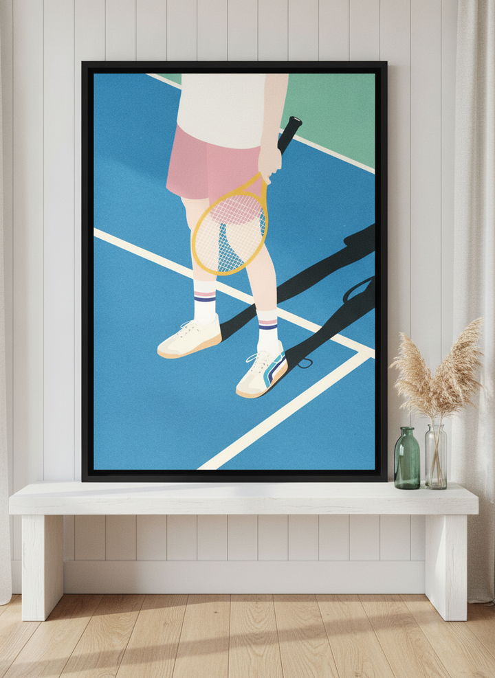 Canvas wall art with a black surround standing on a console in a coastal living room