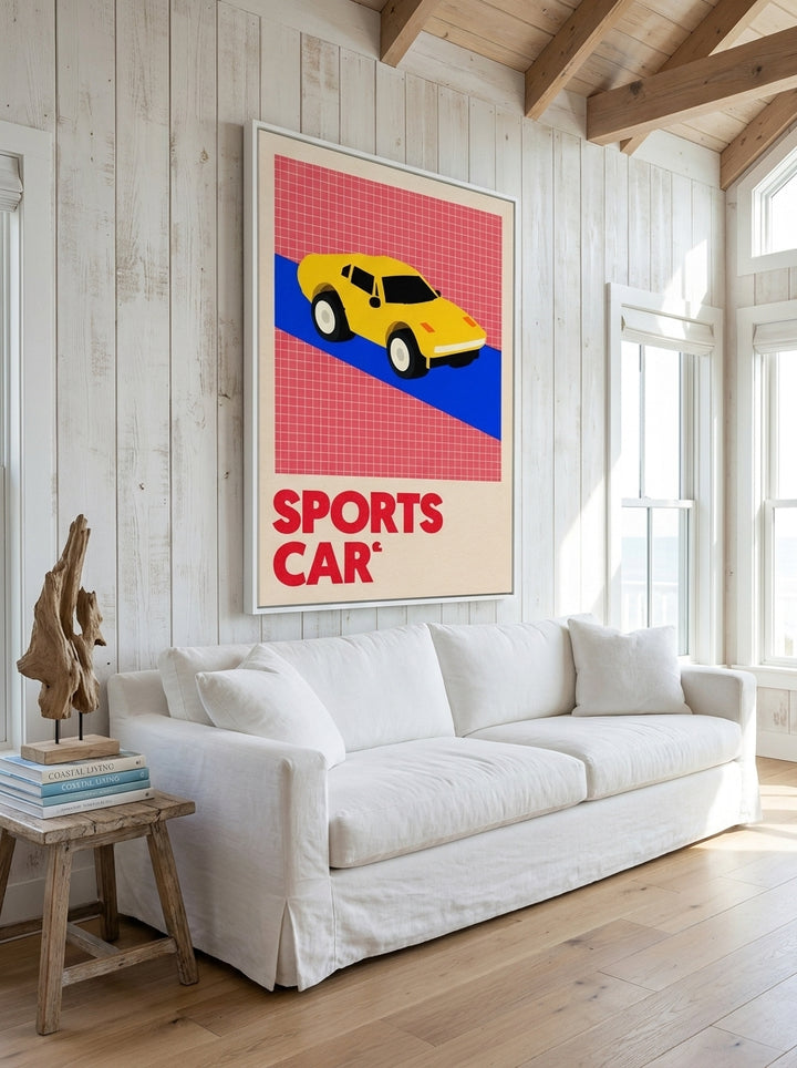 Oversized statement canvas wall art with a white surround styled on the wall in a coastal living room