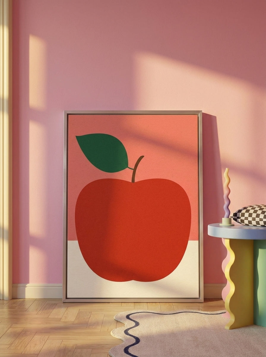 Canvas wall art with a silver leaf surround leaning against the wall in a colourful eclectic dining room
