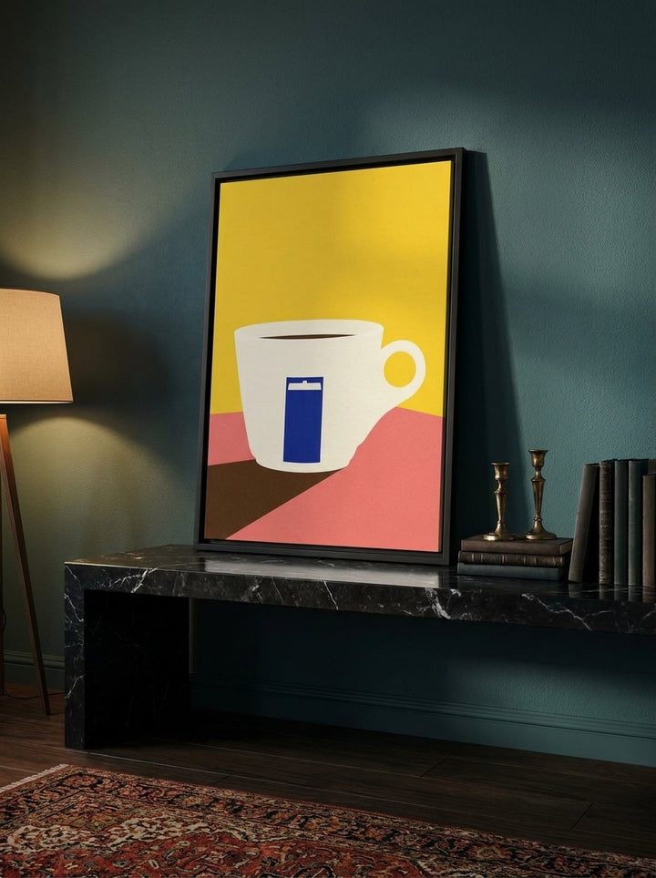 Canvas wall art with a black surround standing on a kitchen bench in a moody kitchen
