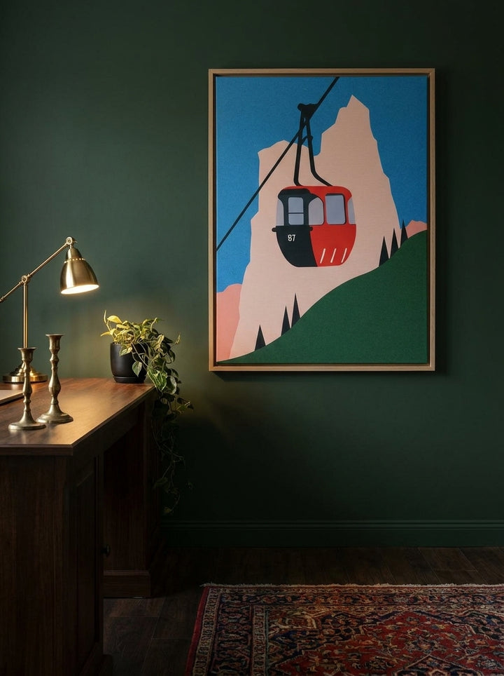 Canvas wall art with a natural timber surround styled on the wall in a moody home office