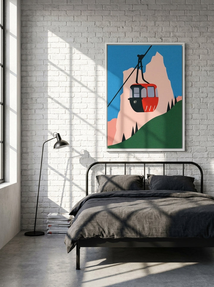 Canvas wall art with a white surround styled on the wall in an industrial loft bedroom