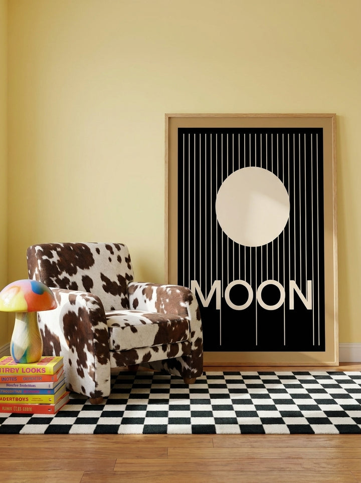 Oversized statement modern wall art print leaning against the wall in a colourful eclectic dining room