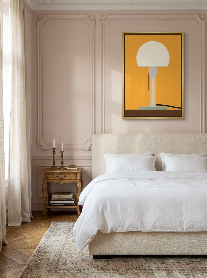 Canvas wall art with a gold leaf surround styled on the wall in a Parisian bedroom