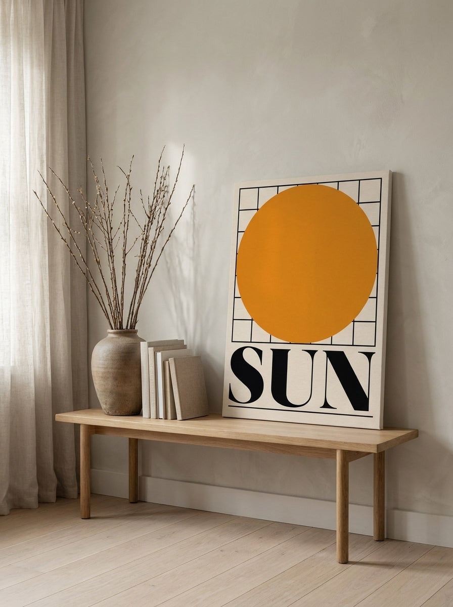 Stretched canvas wall art standing on a bench in a warm Japandi living room