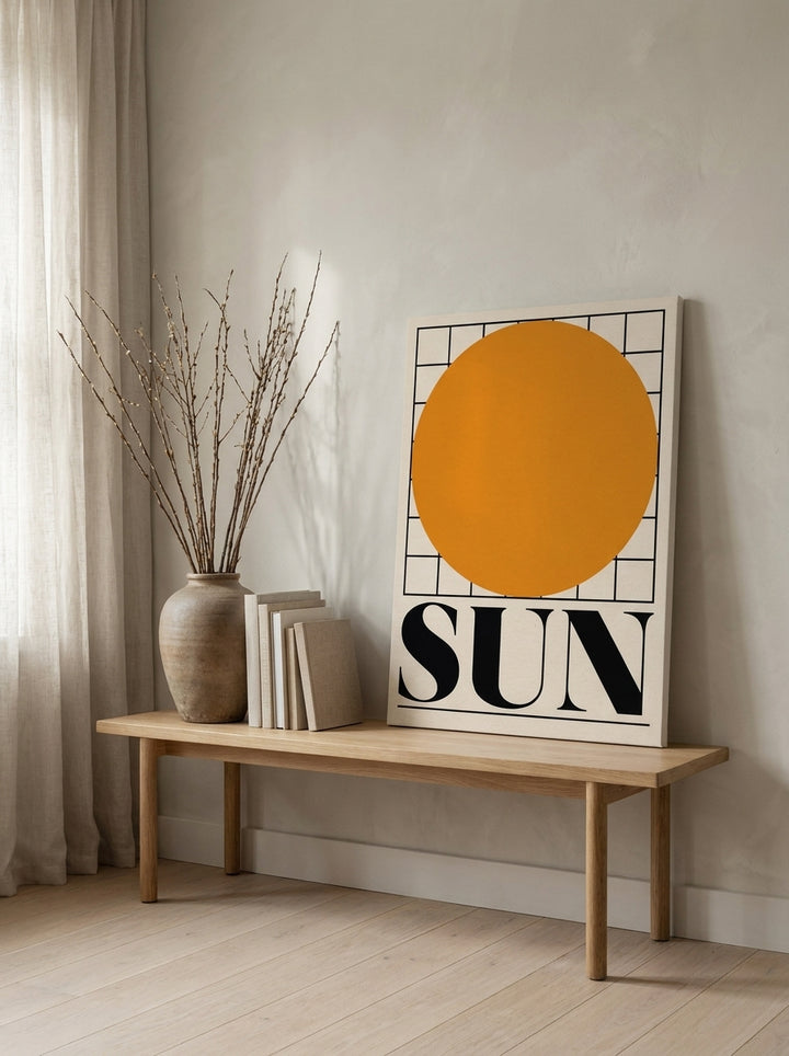 Stretched canvas wall art standing on a bench in a warm Japandi living room