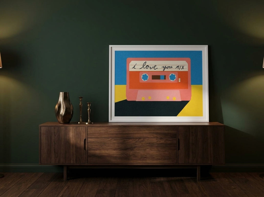 Modern wall art print standing on a sideboard in a moody bedroom