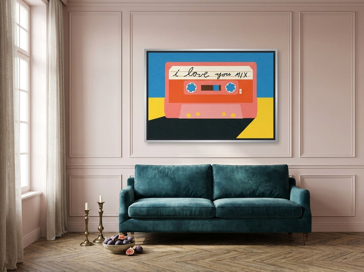 Oversized statement canvas wall art with a silver leaf surround styled on the wall in a Parisian living room
