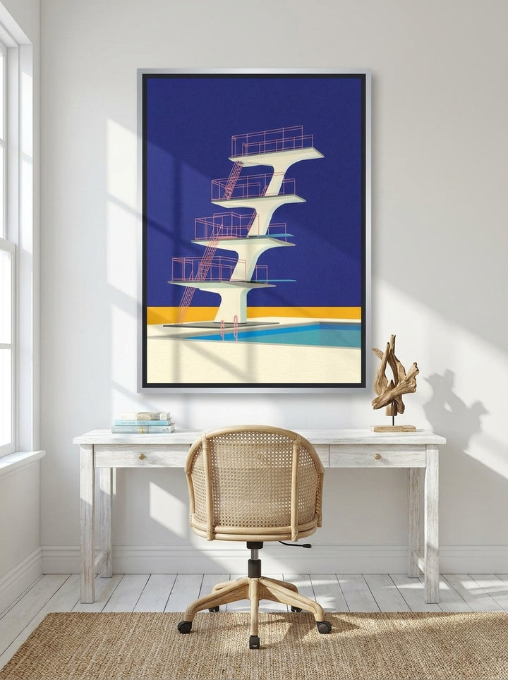 Canvas wall art with a silver leaf surround styled on the wall in a coastal home office