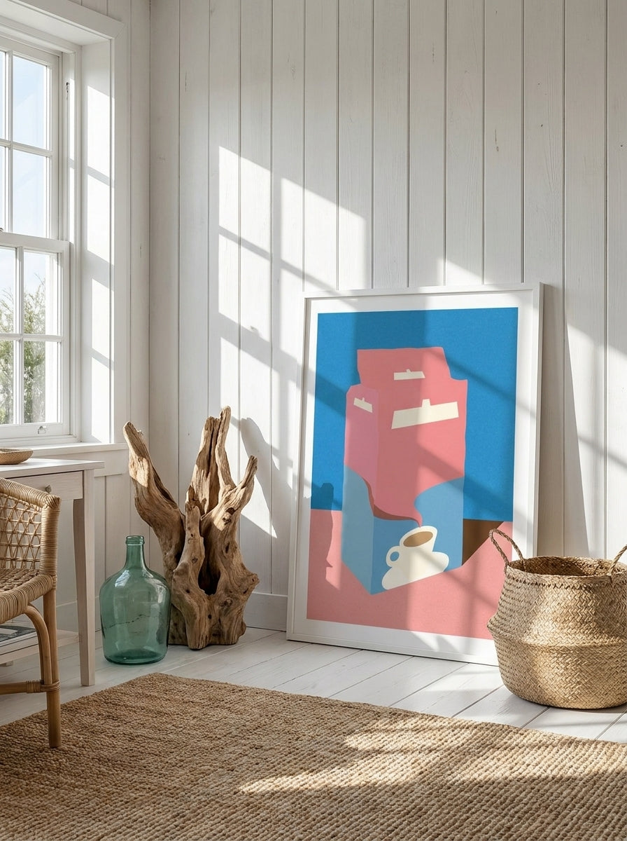 Modern wall art print leaning against the wall in a coastal dining room