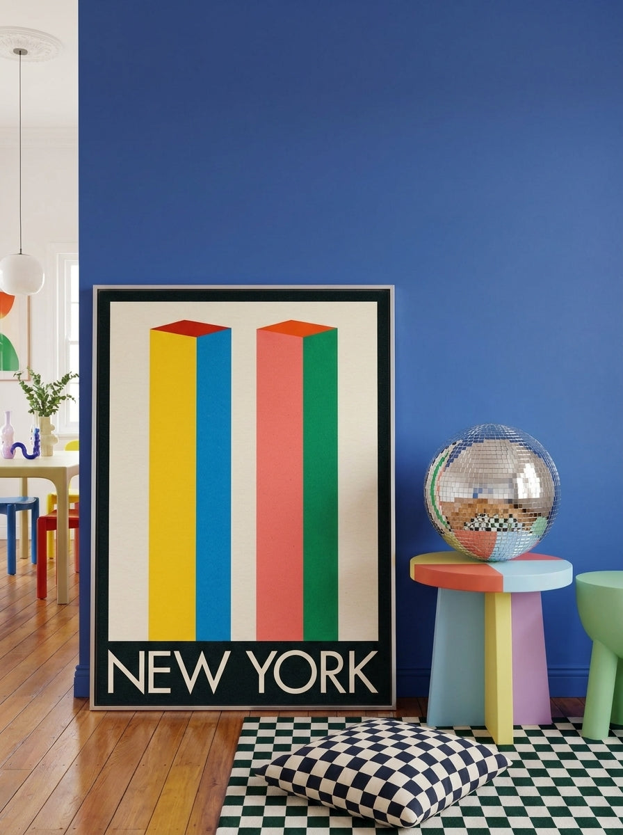 Oversized statement canvas wall art with a silver leaf surround leaning against the wall in a colourful eclectic dining room