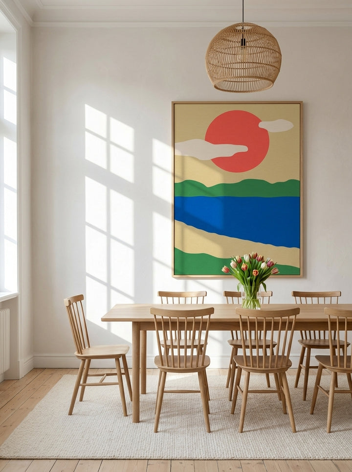 Oversized statement modern wall art print styled on the wall in a bright Scandinavian dining room