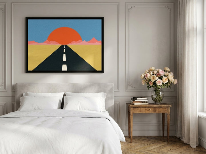 Canvas wall art with a black surround styled on the wall in a Parisian bedroom