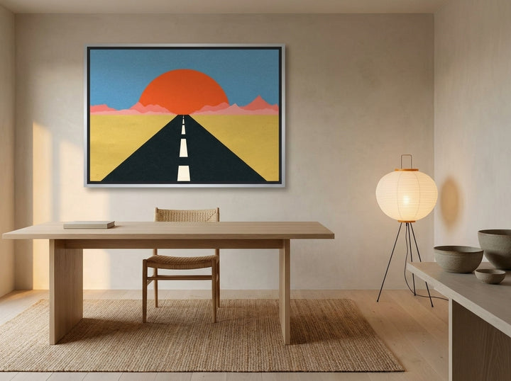 Canvas wall art with a silver leaf surround styled on the wall in a warm Japandi home office