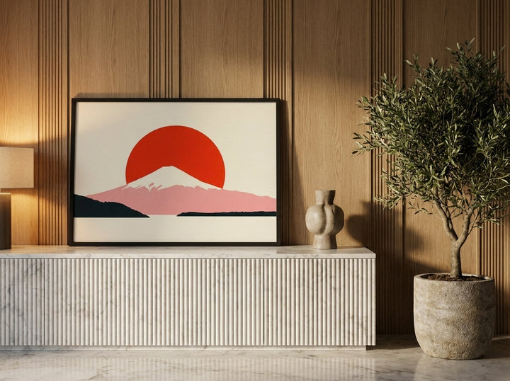 Modern wall art print standing on a sideboard in a luxe living room